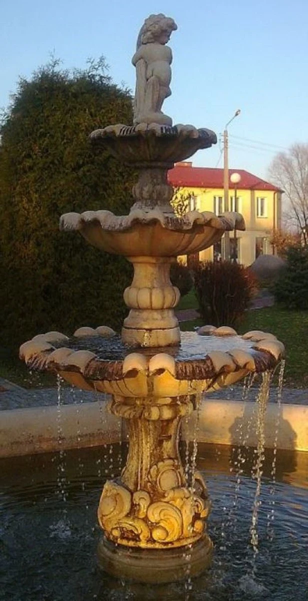 Casa Padrino Barock Springbrunnen / Gartenbrunnen Junge mit Goldfisch Grau Ø 490 x H. 190 cm - Großer 3-Stufiger Brunnen mit Umrandung
