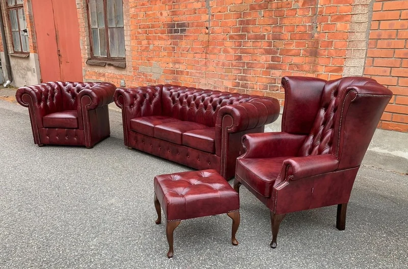 Casa Padrino Luxus Chesterfield Leder Ohrensessel Bordeauxrot / Braun