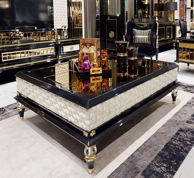 Casa Padrino Luxus Art Deco Couchtisch Schwarz / Cremefarben / Gold - Prunkvoller Massivholz Wohnzimmertisch - Luxus Art Deco Wohnzimmer Möbel