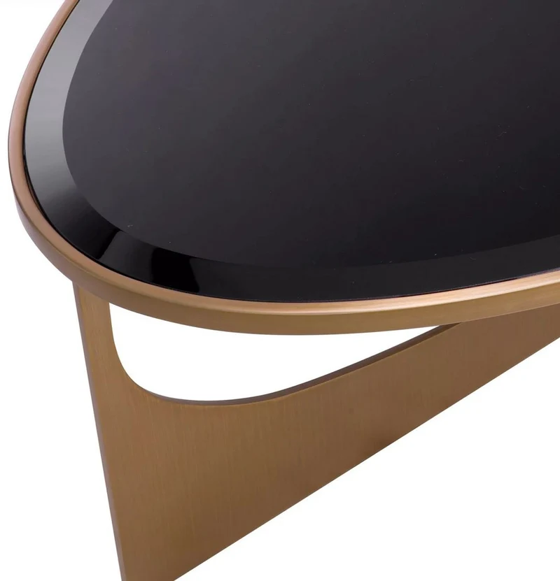 Casa Padrino Luxus Couchtisch Messing / Schwarz 101,5 x 41,5 x H. 78,5 cm - Ovaler Edelstahl Wohnzimmertisch mit Glasplatte - Luxus Möbel - Wohnzimmer Möbel - Luxus Einrichtung
