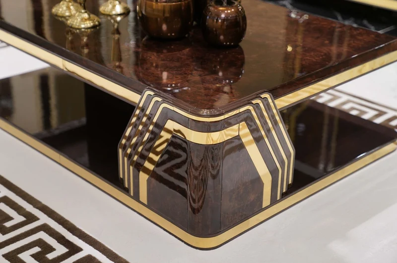 Casa Padrino Luxus Art Deco Couchtisch Braun / Gold - Rechteckiger Wohnzimmertisch - Wohnzimmer Möbel - Art Deco Möbel - Luxus Möbel - Luxus Einrichtung - Wohnzimmer Einrichtung