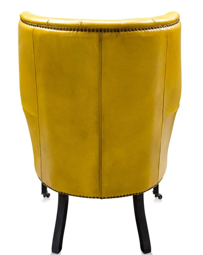 Casa Padrino Luxus Echtleder Sessel Gelb / Schwarz 84 x 85 x H. 112 cm - Luxus Hotel Möbel